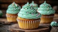 Mint green cupcakes with swirled frosting and sprinkles Royalty Free Stock Photo