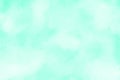 Mint green gradient watercolor background. Hand drawn aquarelle texture. Light green background