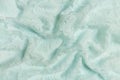 Mint or green guipure with roses. Crumpled or wavy fabric texture background. Abstract linen cloth soft waves. Natural