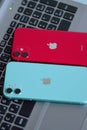 Mint Green & Red color iPhone 11 featuring dual camera
