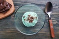 Mint ice cream with chocolate in glass bowl. Delicious gourmet s Royalty Free Stock Photo