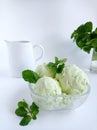 Mint ice cream in glass bowl bright mood stilllife