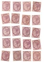 Mint one penny lilac postage stamps featuring a portrait of Queen Victoria. Royalty Free Stock Photo