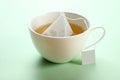 Mint tea bag in a cup Royalty Free Stock Photo