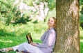 Minute for relax. Education technology and internet concept. Girl work with laptop in park sit on grass. Natural Royalty Free Stock Photo