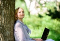 Minute for relax. Girl work with laptop in park sit on grass. Education technology and internet concept. Natural Royalty Free Stock Photo