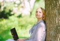 Minute for relax. Girl work with laptop in park sit on grass. Education technology and internet concept. Natural Royalty Free Stock Photo