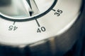 40 Minutes - Macro Of An Analog Chrome Kitchen Timer On Wooden T