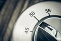 50 Minutes - Macro Of An Analog Chrome Kitchen Timer On Wooden T Royalty Free Stock Photo