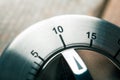 10 Minutes - Macro Of An Analog Metal Timer On A Wooden Floor Royalty Free Stock Photo