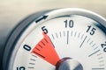 5 Minutes - Macro Of An Analog Timer On A Wooden Floor