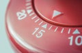 15 Minutes - Macro Of A Flat Red Kitchen Egg Timer Royalty Free Stock Photo