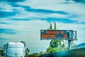 Minutes to downtown road sign in a Los Angeles freeway Royalty Free Stock Photo