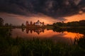 Mir Castle, Belarus. Scenic Panoramic View Of Mir Castle Complex In Thunderstorm Summer Morning From Side Of Lake.