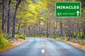 MIRACLES road sign against clear blue sky Royalty Free Stock Photo