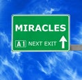 MIRACLES road sign against clear blue sky