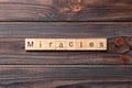 miracles word written on wood block. miracles text on cement table for your desing, concept Royalty Free Stock Photo