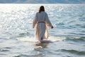 Miraculous moment as Jesus walks on water on Sea of Galilee, generative AI