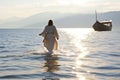 Miraculous portrayal of Jesus Christ walking on water at Sea of Galilee, generative AI