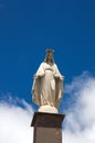 Miraculous statue with blue sky in the background