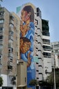 Giant Wall Art of a man and woman on a high building. Miraflores, Peru, October 2, 2023.