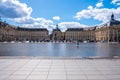 The Miroir d`eau or Miroir des Quais on the quay of the Garonne in front of the Place de la Bourse in Bordeaux Royalty Free Stock Photo