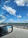 Mirror on car clouds peaceful good weather