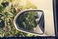 Mirror beside of car with nature. Royalty Free Stock Photo