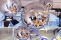 Mirror disco balls and a searchlight on a New Year`s background Royalty Free Stock Photo