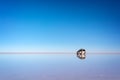 Mirror effect and reflections of a 4x4 car in Salar de Uyuni Uyuni salt flats, Potosi, Bolivia