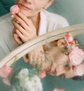 woman spring flowers mirror face lips freshness Royalty Free Stock Photo