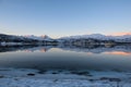 Mirror-like reflections in a Norwegian fjord near TromsÃÂ¸ Royalty Free Stock Photo