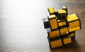 Mirror magic cube on wooden background