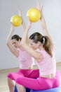 Mirror pilates gym woman stability ball sport gym Royalty Free Stock Photo