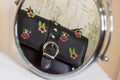 A mirror reflection of a black designed handbag Royalty Free Stock Photo