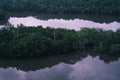 Mirror reflection on the lake in Sri Manning, Limit, Perak, Malaysia. Royalty Free Stock Photo