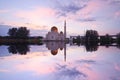 Mirror reflection of majestic floating mosque at malacca straits Royalty Free Stock Photo