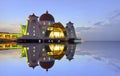 Mirror reflection of majestic floating mosque at malacca straits Royalty Free Stock Photo