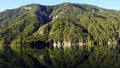 Mirror reflection of the mountains in the lake Weissensee Austrian state of Carinthia Royalty Free Stock Photo