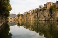 Reflection of the old city of Tbilisi in the river Kura