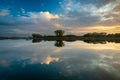 Mirror reflection in the water of evening clouds Royalty Free Stock Photo