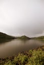 Mirror smooth water of the carpathian Zetelaka lake. Beautyful landscape after rain Royalty Free Stock Photo
