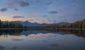 Mirror Surface Lake Pink Sunset Light Autumn Landscape With Mountain Range On Background