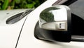 Mirror wing of white car. Royalty Free Stock Photo