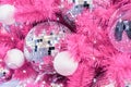 Mirrored disco balls on a pink Christmas tree Royalty Free Stock Photo