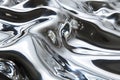 Mirrored Reflections on a Liquid Chrome Surface