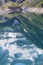 Mirroring Alpes in artificial Lake Grand-Maison, France