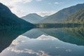 Mirroring mountain lake during sunrise in the Austrian alps Royalty Free Stock Photo