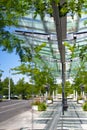 Mirroring the streets in the glass walls of modern building