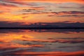 Mirroring waters at sunset